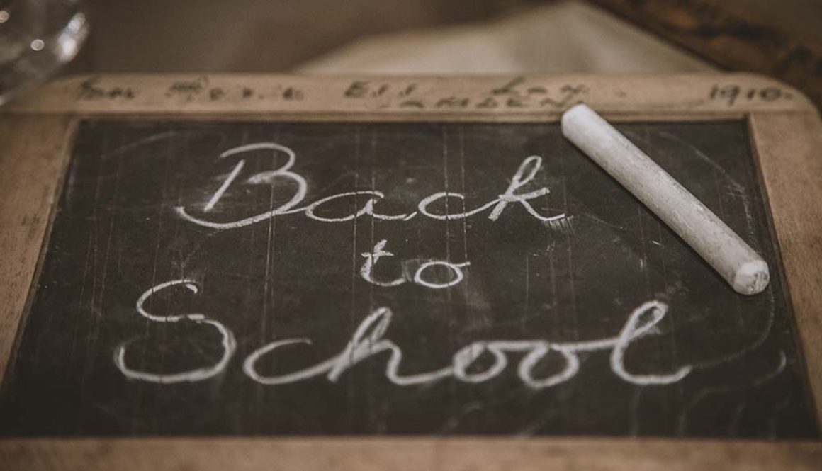 the words "Back to School" written on a small chalkboard