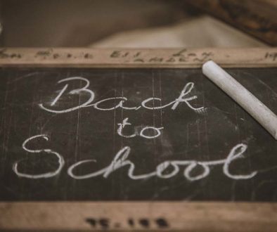 the words "Back to School" written on a small chalkboard